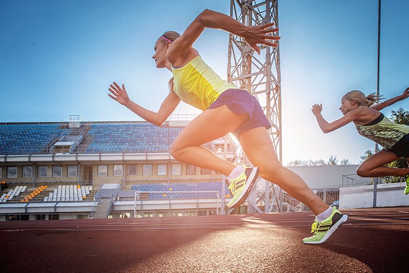 Athlete sprinting on outdoor track