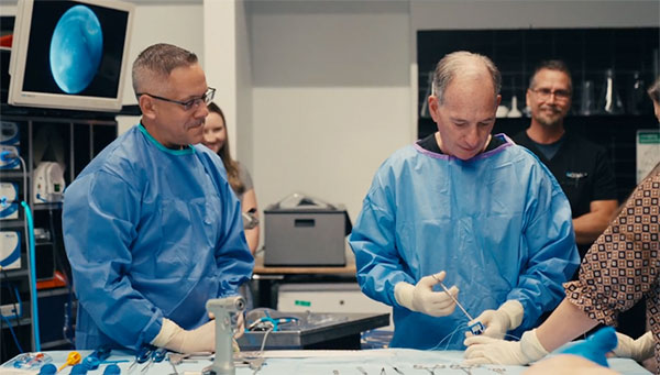 Surgeons demonstrating BioBraceRC