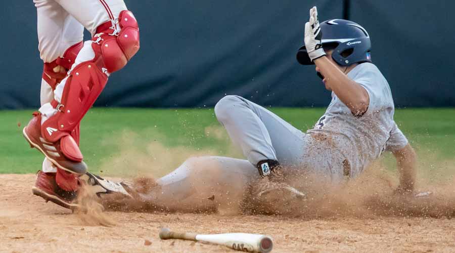 baseball-player-slides-into-homeplate