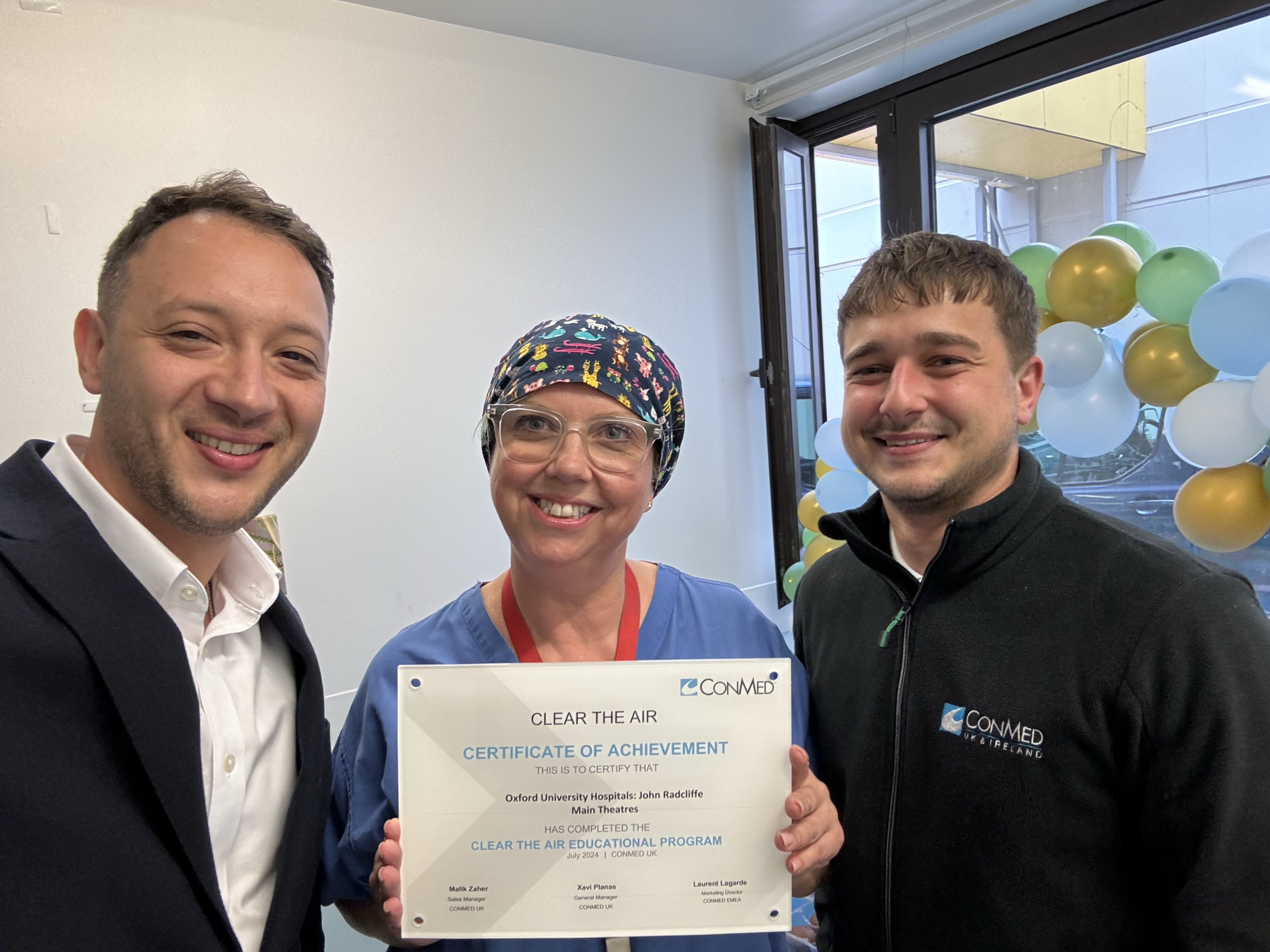 Image of Laura Cuthbertson up a Certification of Clear the Air Education Program