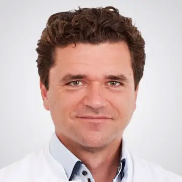Dr. med. Robert Hudek Headshot